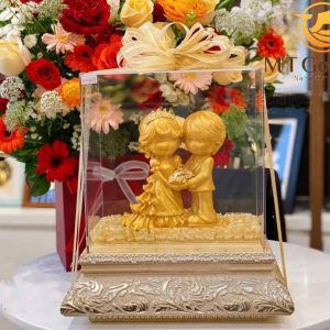 Tượng cô dâu chú rể dát vàng (17x29x34cm) qua tang ky niem ngay cuoi tuong co dau chu re