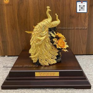 qua cuoi y nghia tuong doi chim ccong dat vang