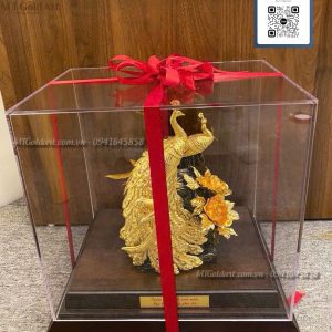 qua cuoi y nghia tuong doi chim cong dat vang1