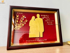quà tặng mừng thọ cha mẹ 70 tuổi- tranh chân dung cha mẹ