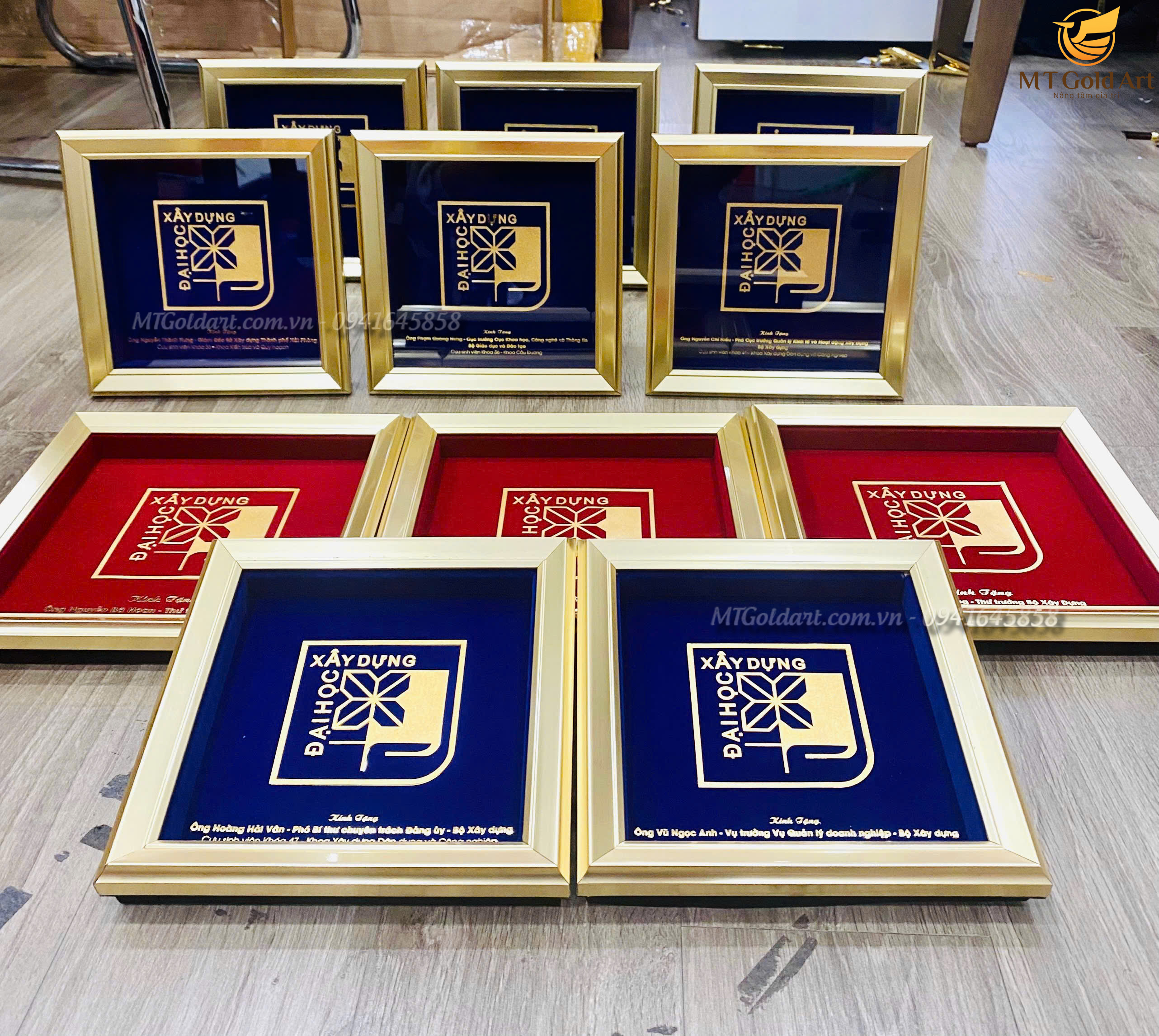 qua tang tri an cuu hoc sinh tranh logo dai hoc xay dung dat vang1